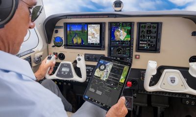 Pilot checking his gps on a tablet