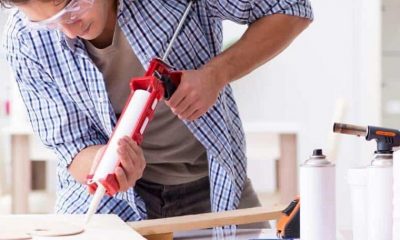 man working with industrial adhesive