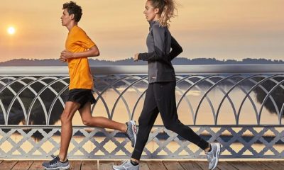 man and woman running wearing mizuno sportswear